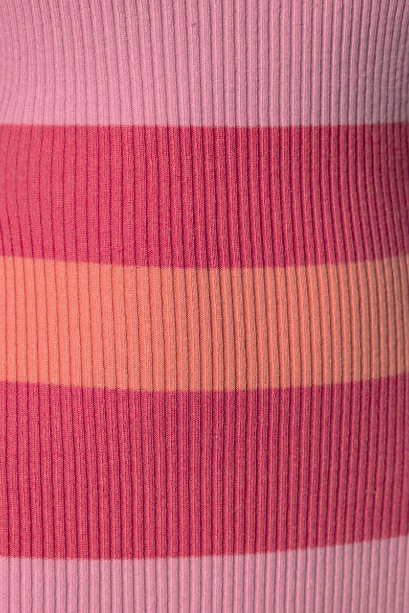 Close-up of ribbed knit fabric in pink and orange stripes, showcasing texture for Dream Girl Midi Dress.