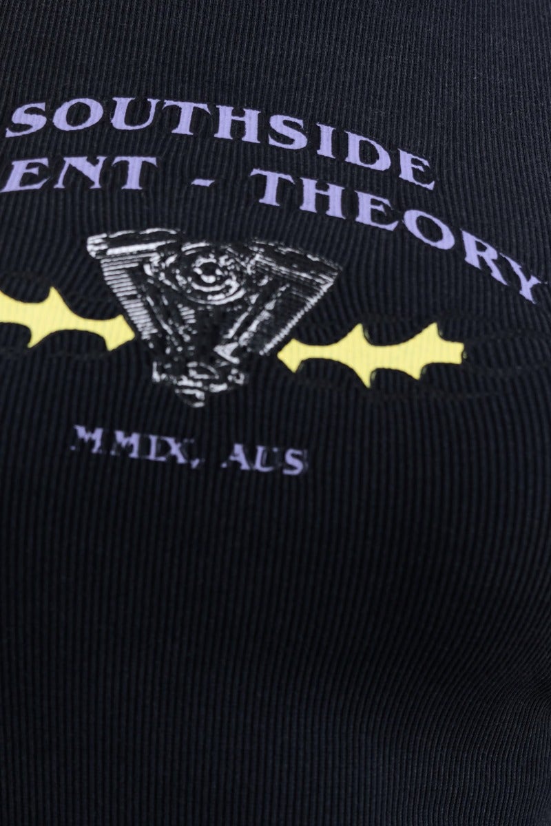 Close-up of the Southside print on a ribbed black dress by Silent Theory, showcasing its unique design and style.