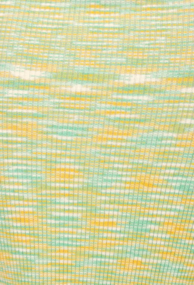Close-up of ribbed knit fabric in yellow and green tones, showcasing stretch and texture for Tamias Midi Dress.