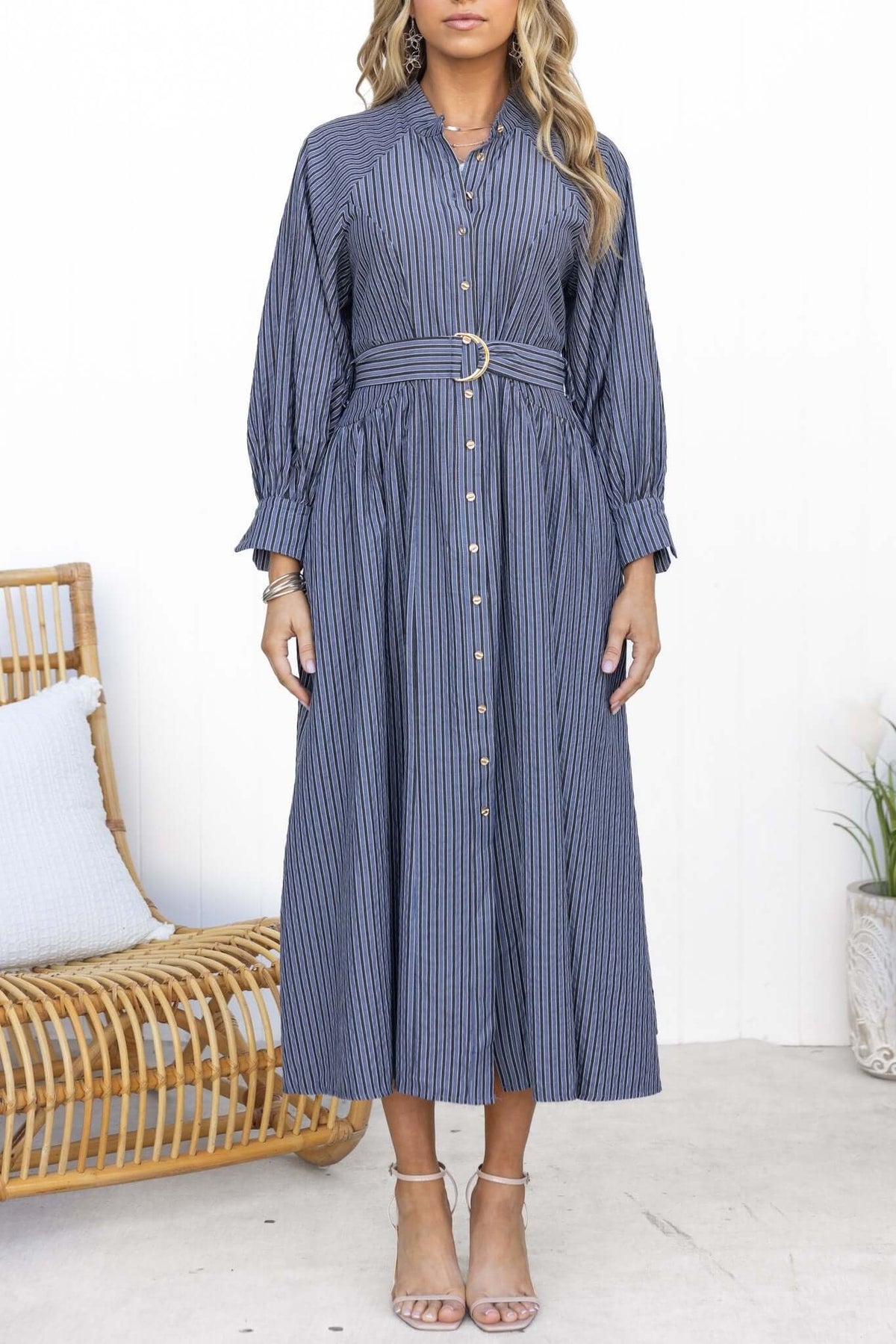 Greyer Maxi Dress in blue stripe with button-up front, elastic sleeves, and removable belt, styled elegantly.