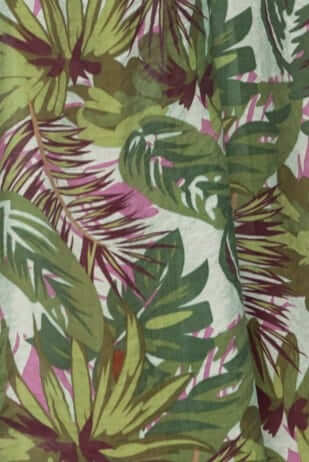 Close-up of vibrant multi-colour print featuring tropical leaves for Sun Dazed Jumpsuit.