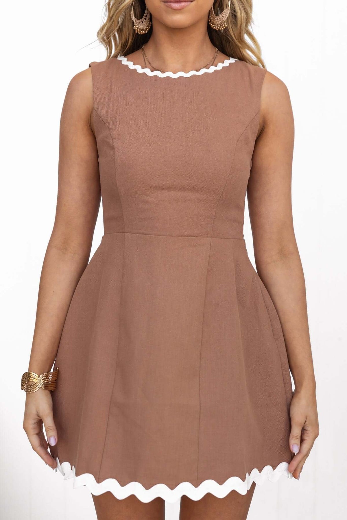 Mayfield Dress in brown with high neckline and scalloped hem, perfect for casual or semi-formal occasions.