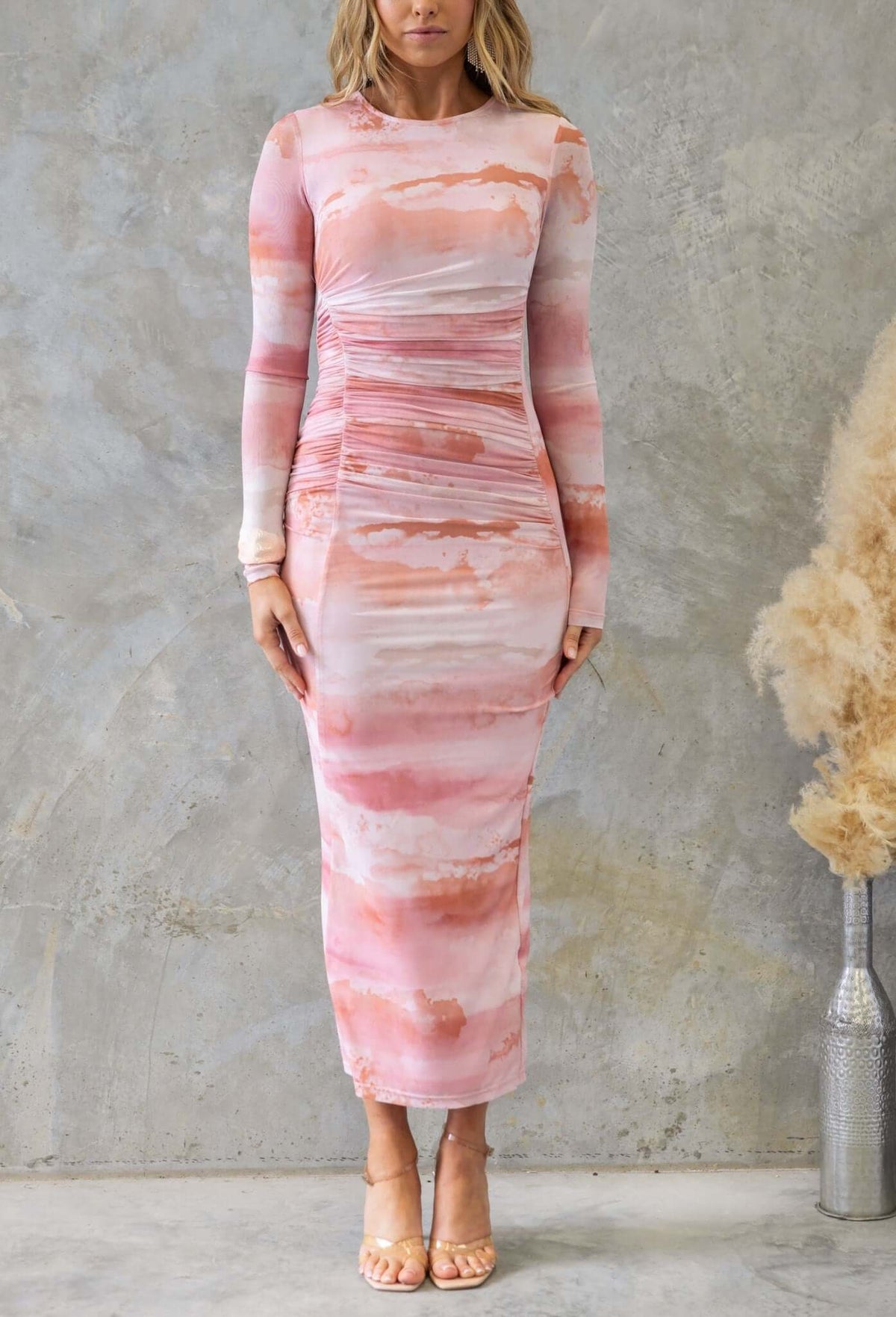 Neenah Maxi Dress featuring a round neckline, front ruching, and a colorful pink abstract design. Perfect for stylish occasions.