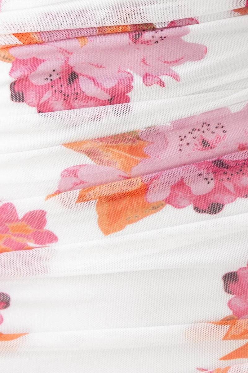 Floral mesh overlay fabric in soft pink and orange hues for the Obvious Maxi Dress, featuring delicate ruching details.