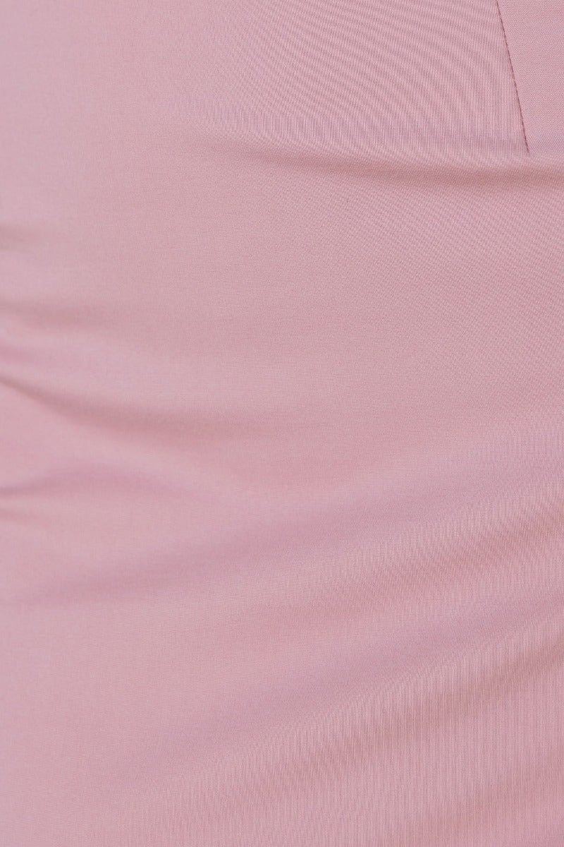 Close-up of soft structured material in light pink for the History Midi Dress featuring a bodycon fit.