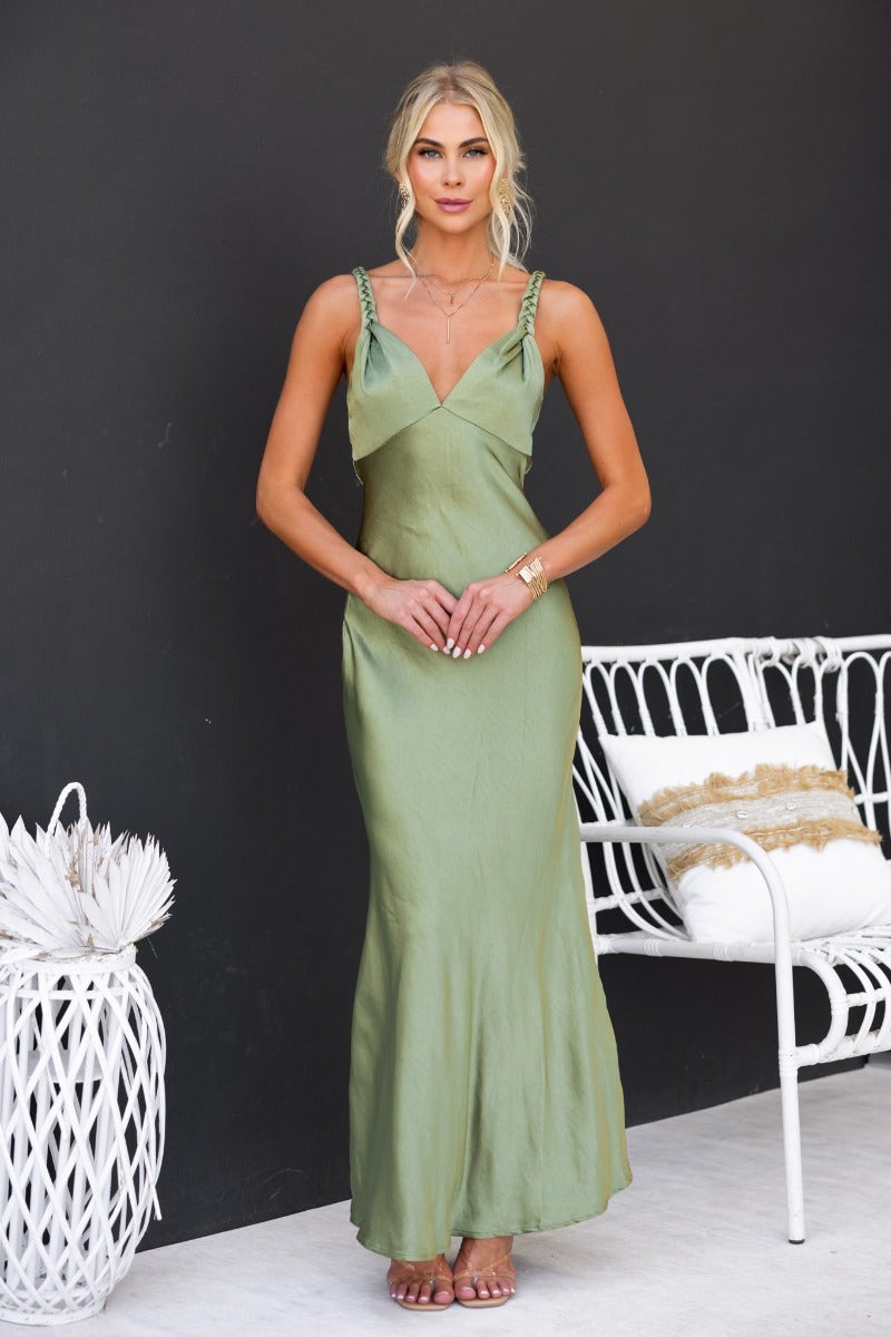 Forest maxi dress in soft green fabric with adjustable straps and elegant design, perfect for special occasions.