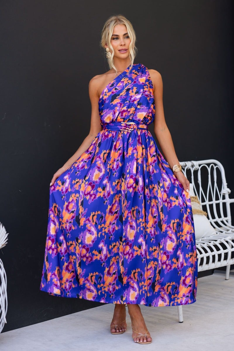 Colorful one-shoulder maxi dress with elastic waistband and removable belt, perfect for summer occasions.