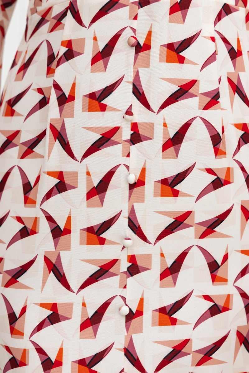 Close-up of Kiran Maxi Dress featuring multi-colour abstract print and faux button-up detail.