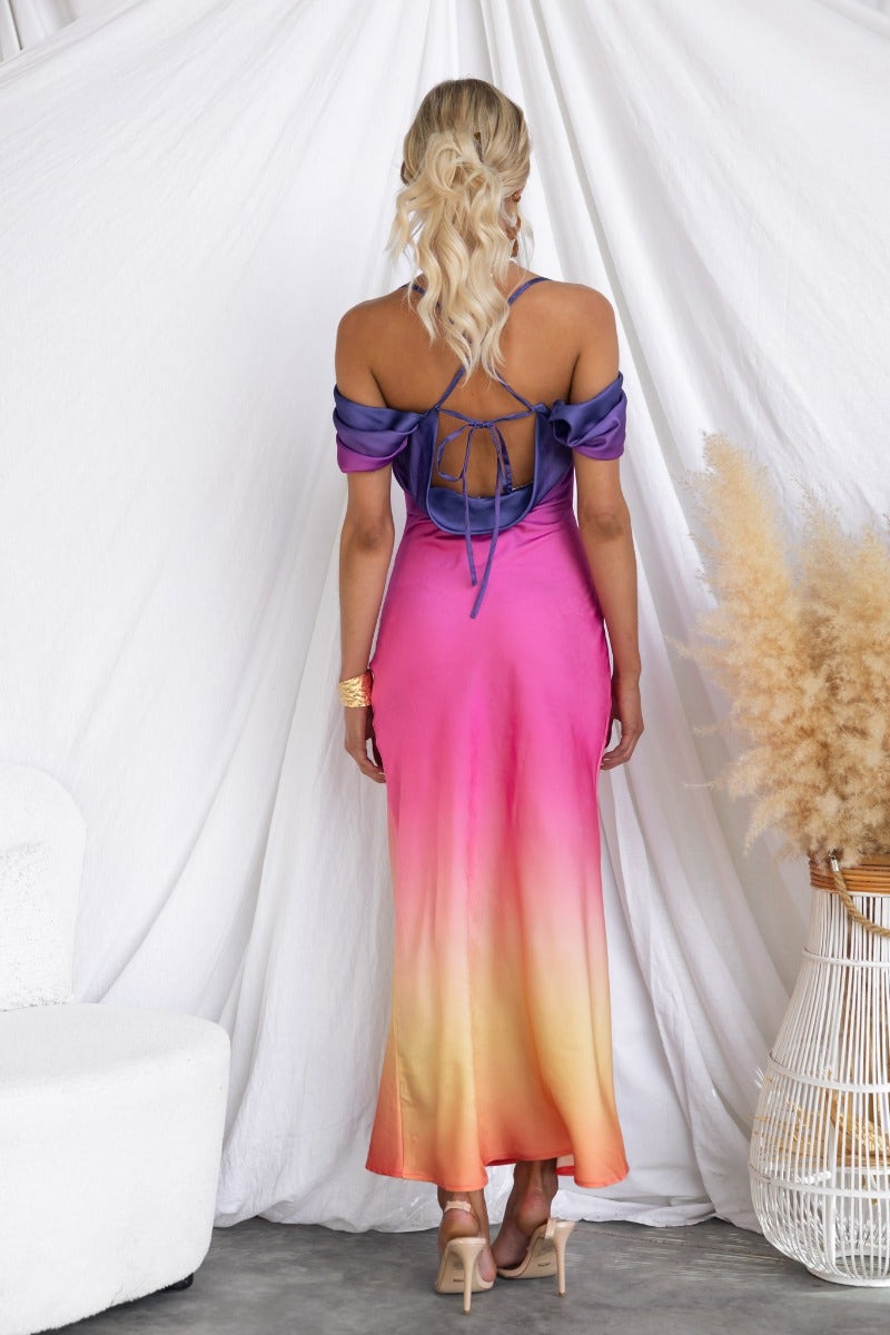 Back view of Jiah Maxi Dress showcasing vibrant colors, adjustable tie straps, and cap sleeves.