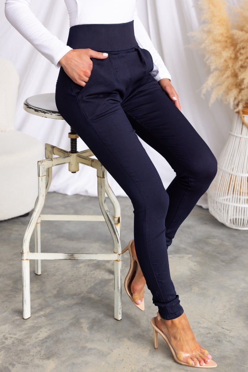 Model wearing All About You Navy Pants with high waist and front pockets, showcasing a super tight fit.