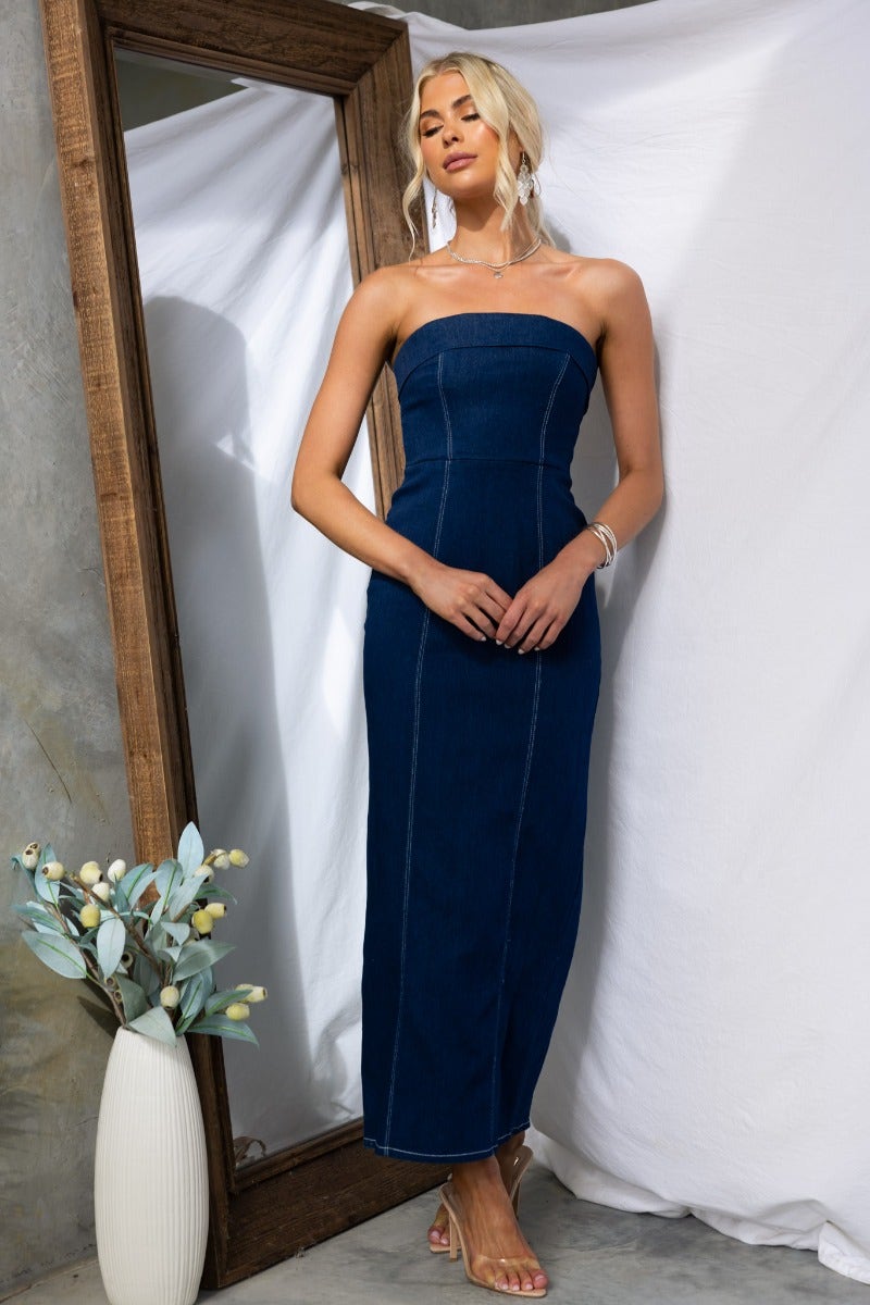 Dalian Denim Maxi Dress in navy, strapless design, showcasing a fitted silhouette and stylish split at back.