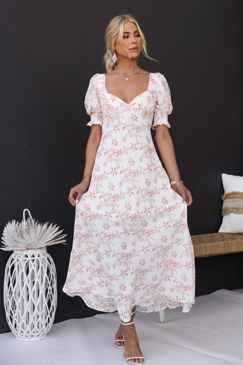 Have A Moment Maxi Dress featuring floral print, puff sleeves, open back, and a flowing silhouette.