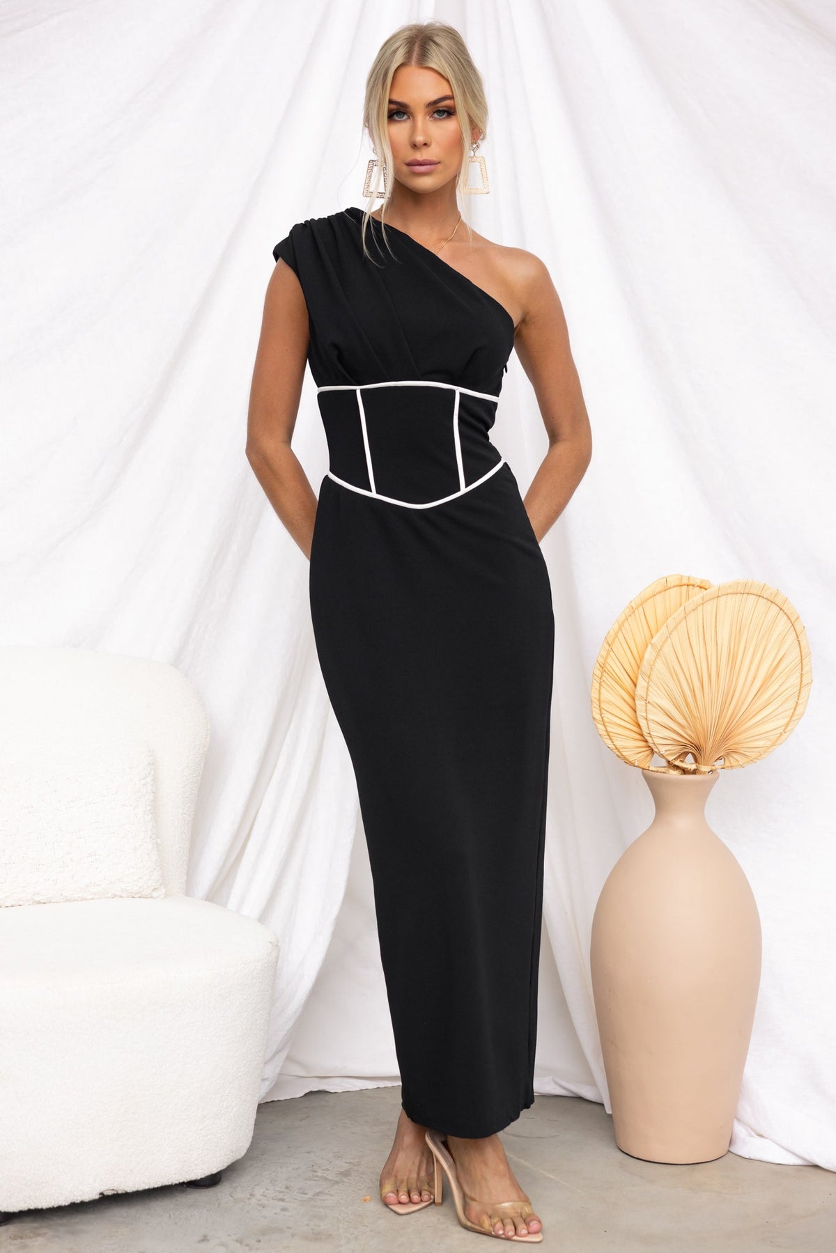 Elegant black Vega Maxi Dress with one-shoulder neckline and stylish side split, perfect for any occasion.