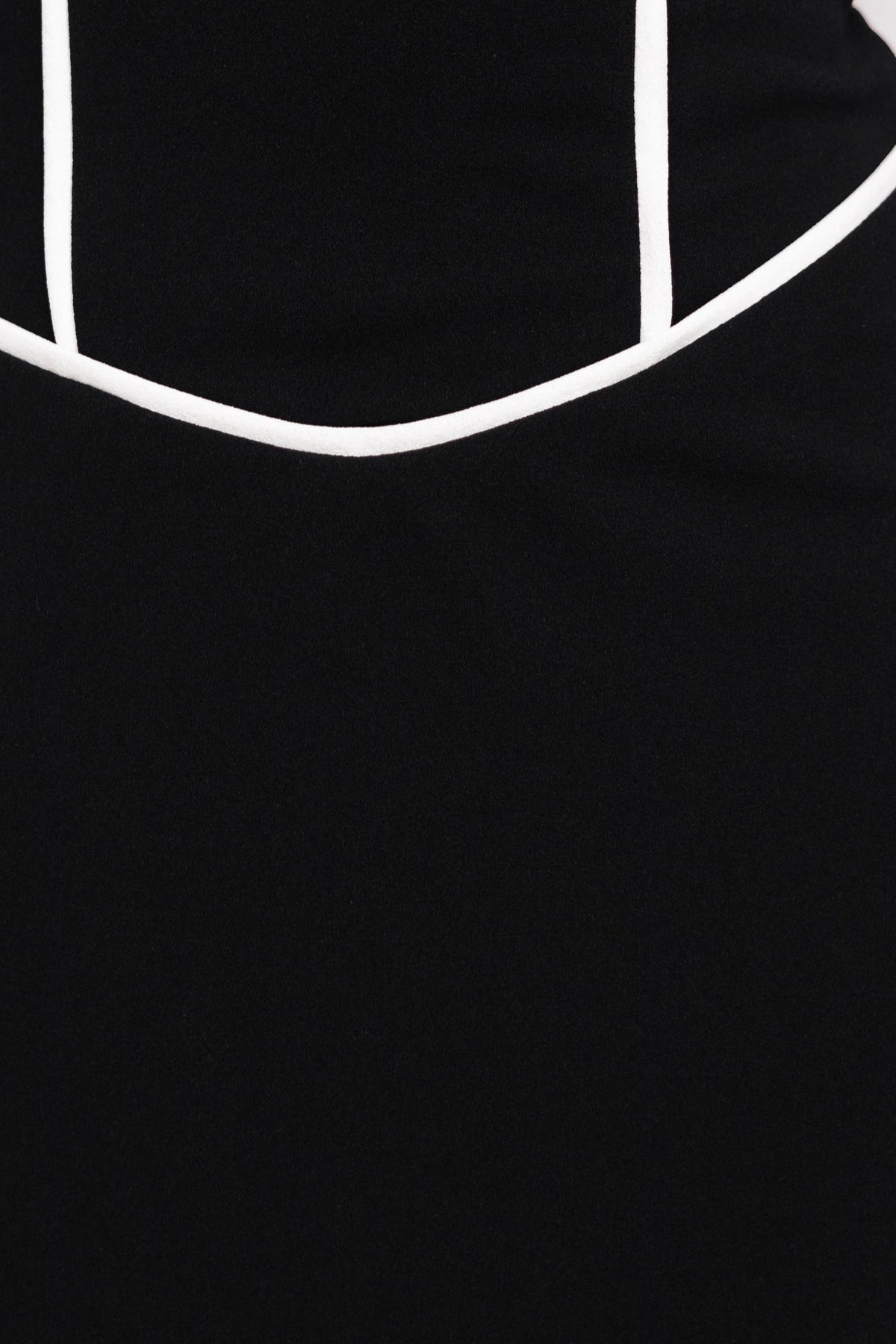 Close-up of the one-shoulder neckline and crepe material of the black Vega Maxi Dress.