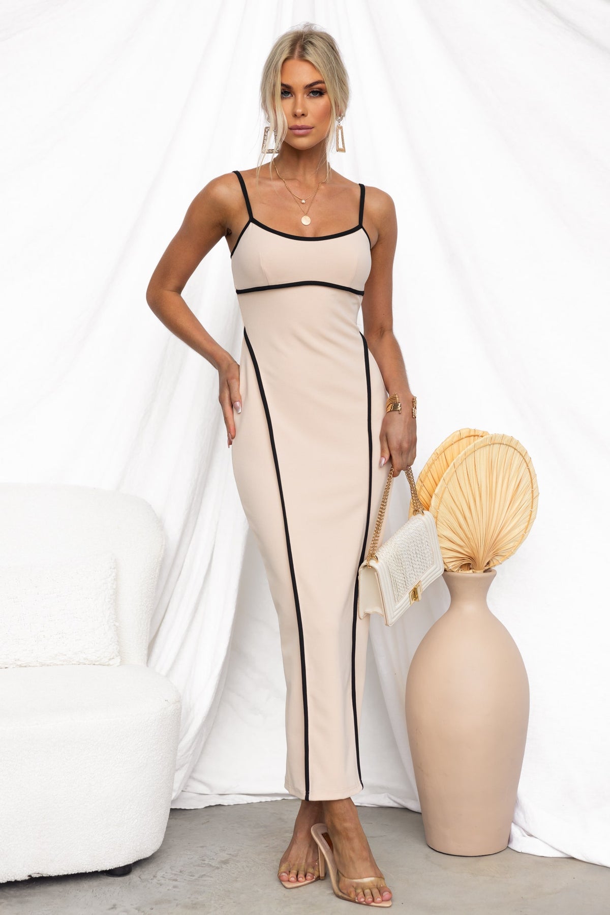 Nabila Maxi Dress featuring adjustable straps and a stylish split back, made from stretchy crepe material.