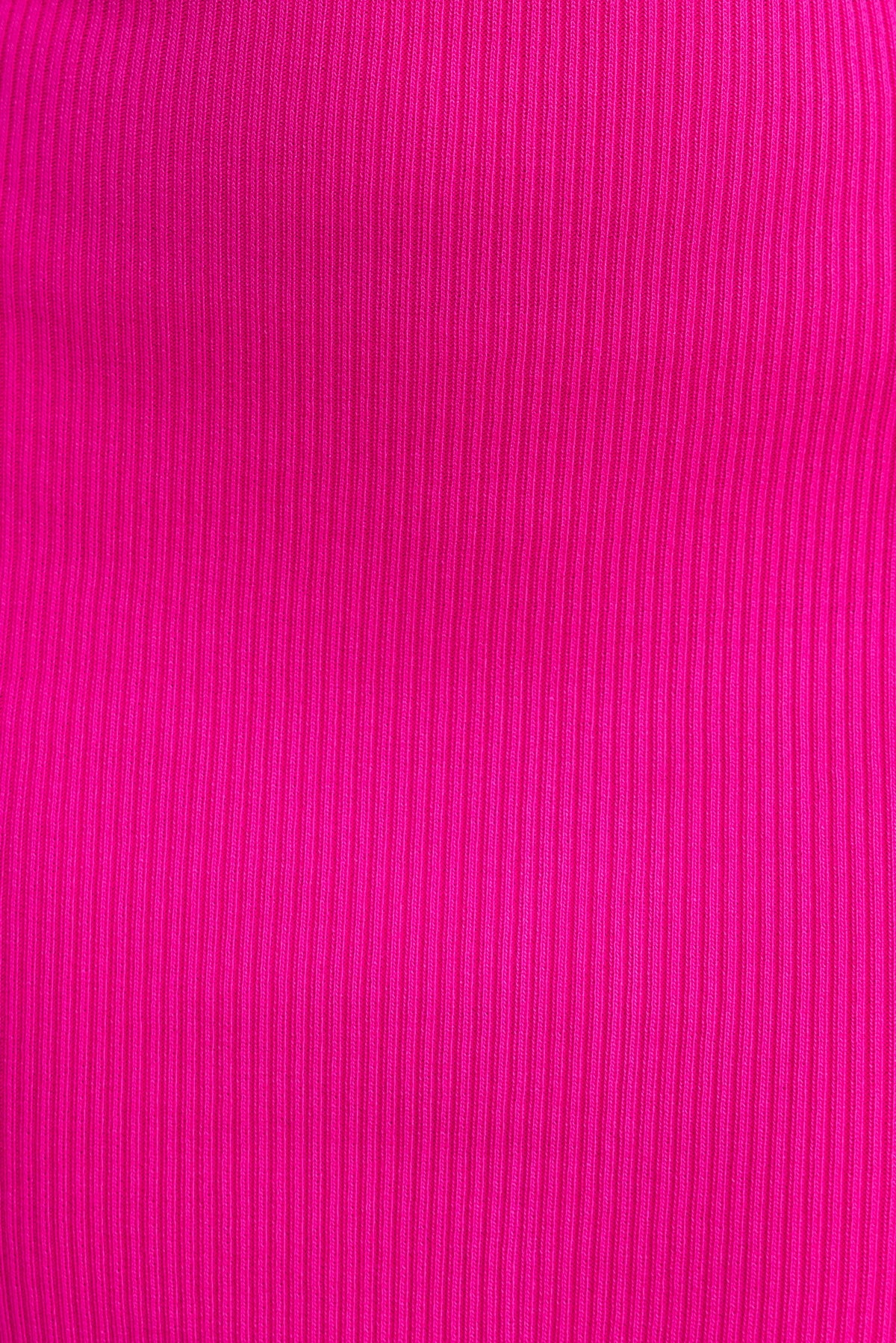 Close-up of vibrant pink ribbed fabric for a stylish, stretchy midi dress.