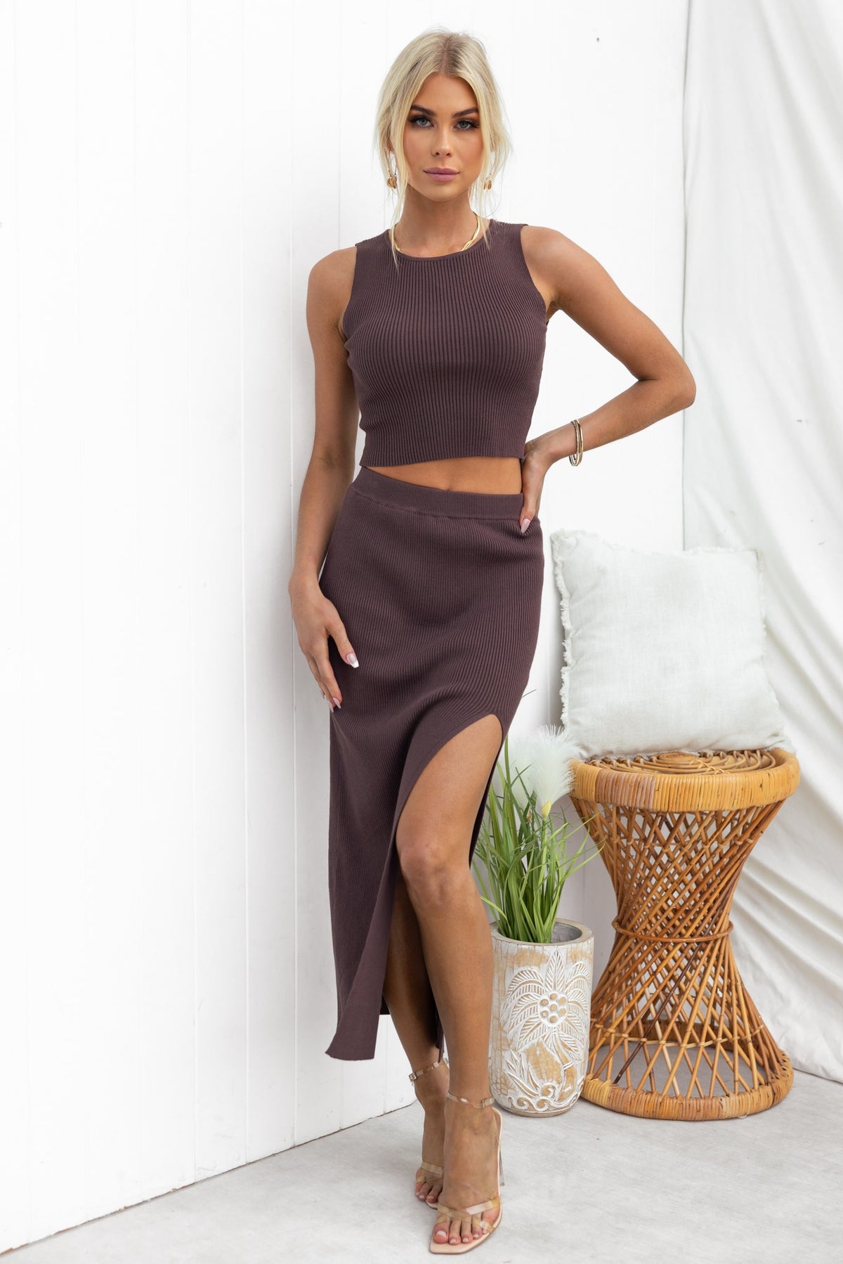Model showcasing the Estha Top with ribbed texture, styled with a matching skirt for a chic look.