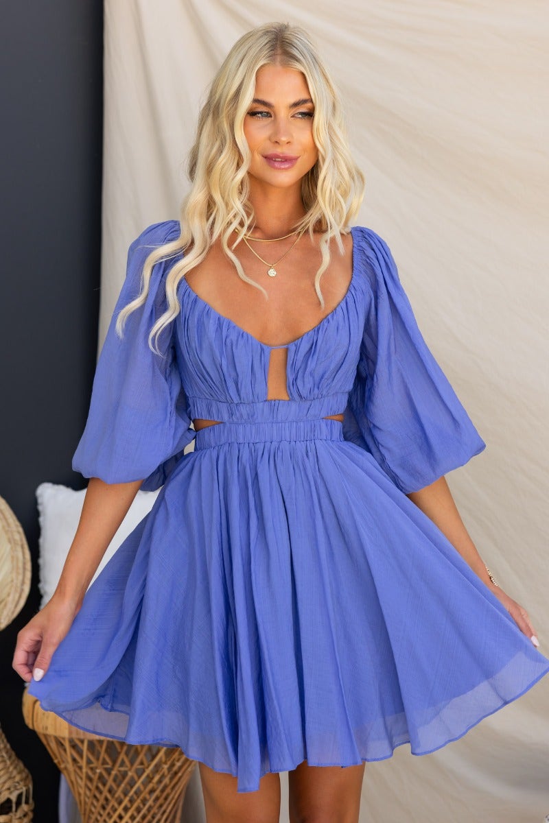Violet Chemistry Dress featuring a cut-out design, puffed sleeves, and a flared skirt, perfect for chic summer outings.