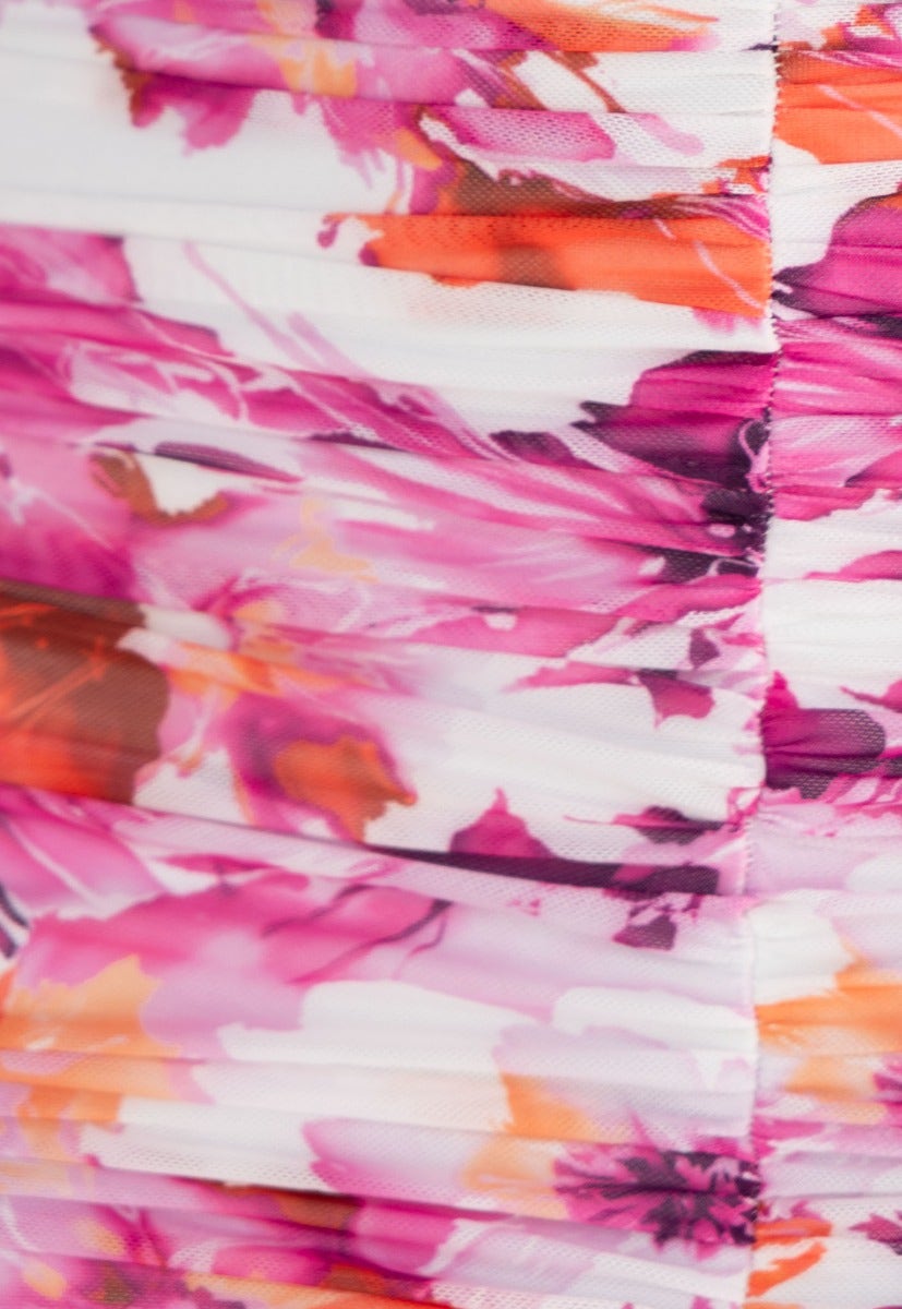 Close-up of vibrant pink and orange floral print on Rosetta Maxi Dress with ruched detailing.