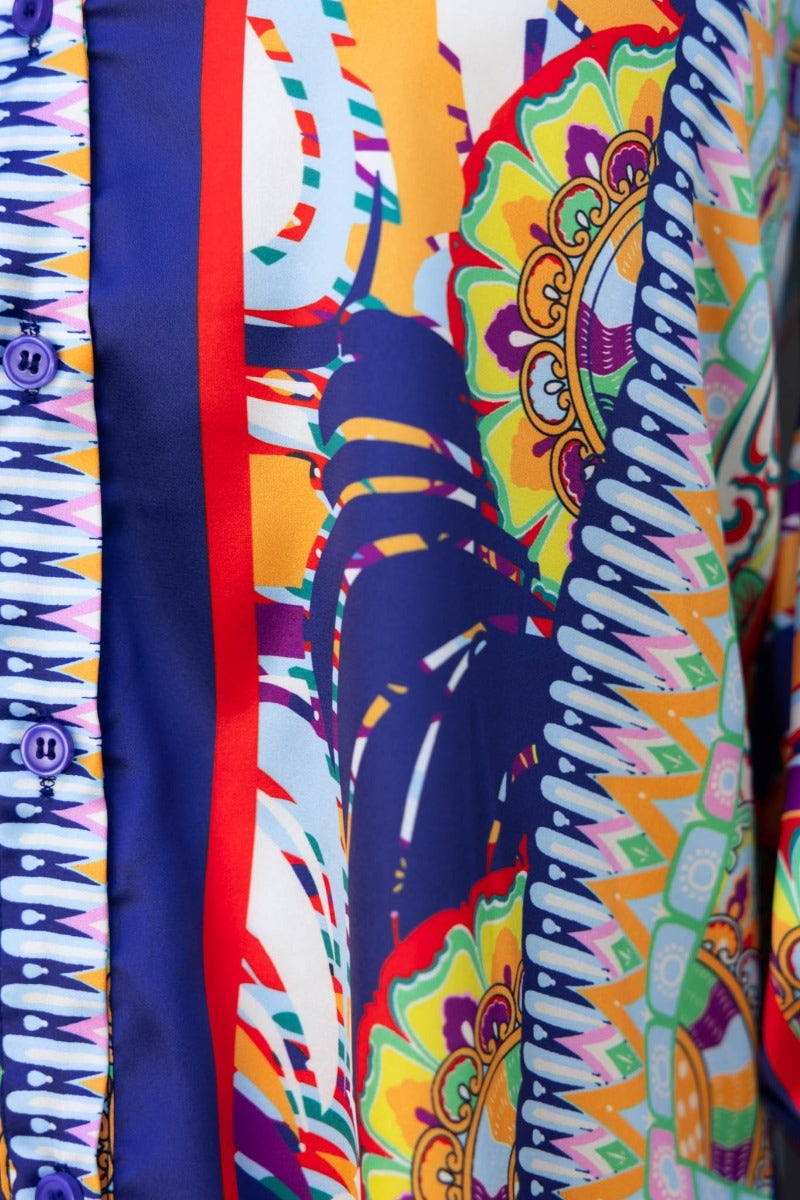 Close-up of the Indianna Shirt featuring vibrant navy-based print, satin texture, and button-up details.