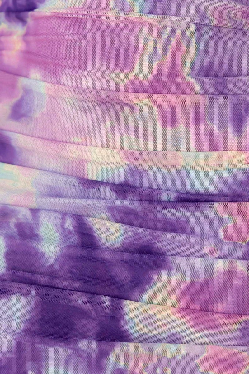 Close-up of Eris Midi Dress fabric, showing watercolor-like purple and lavender tones with gathered details.