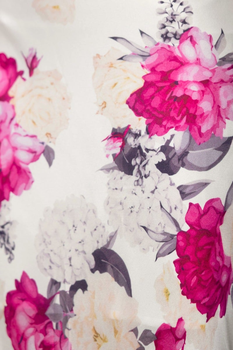 Close-up of floral print featuring pink and white peonies, ideal for Thia Set's elegant satin fabric design.