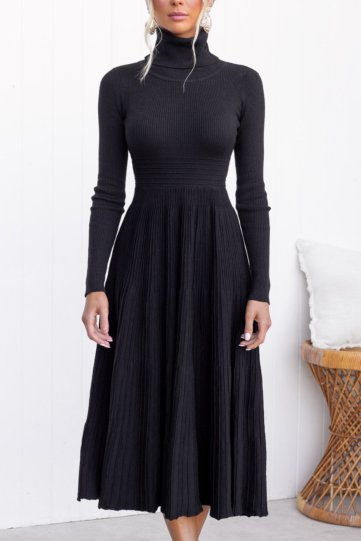 Black Parkley Midi Dress with turtle neckline and ribbed knit material, perfect for casual or semi-formal occasions.