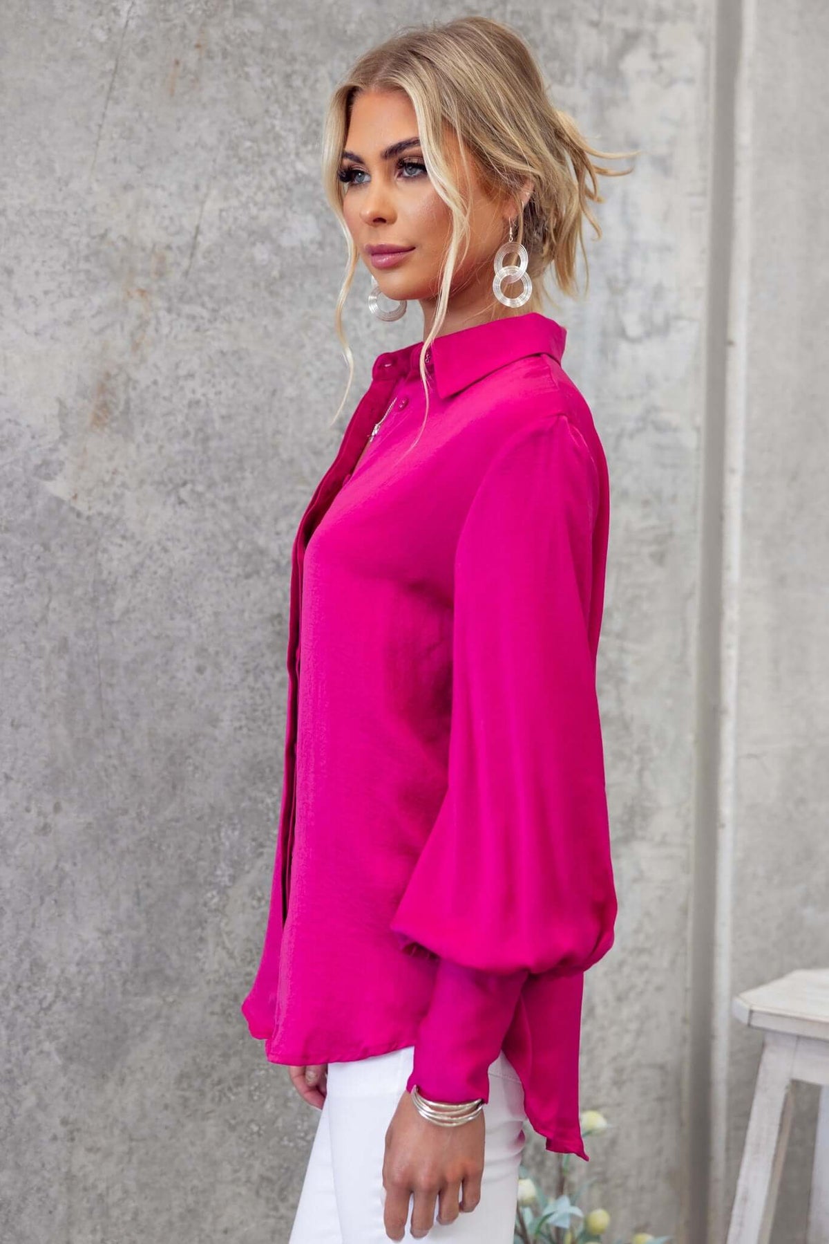 Ravia Shirt in vibrant pink, featuring a button-up front and relaxed fit, perfect for stylish casual wear.