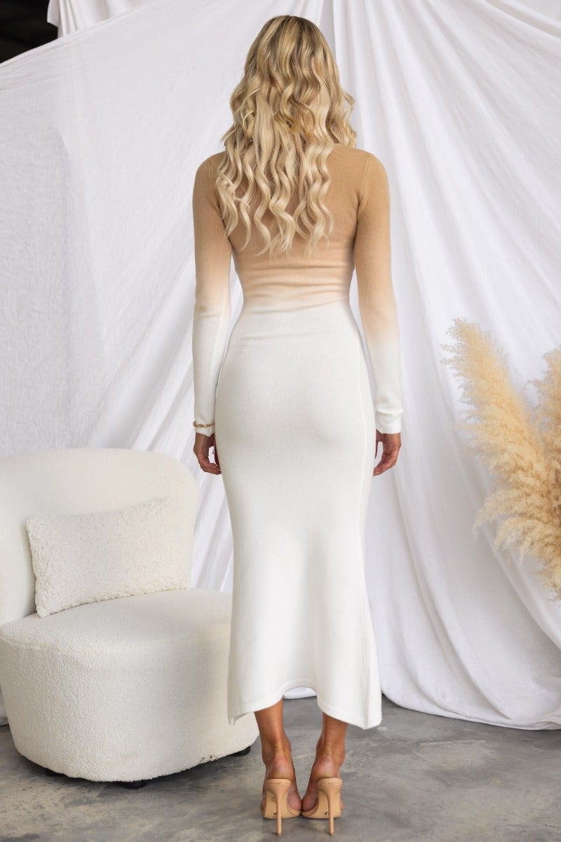 Back view of Zayla Maxi Dress showcasing ribbed knit fabric and round neckline, styled in an elegant setting.