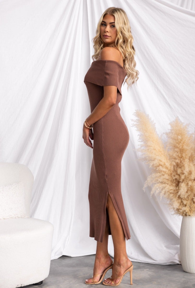 Devoted Midi Dress in ribbed knit, off-shoulder neckline, side split, worn by model, perfect for casual outings.