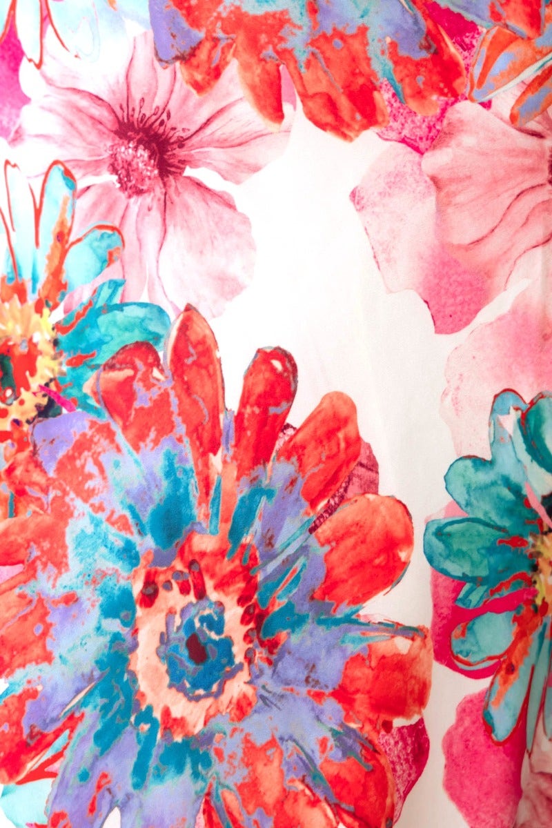 Vibrant floral print of various colors featuring bold blossoms, ideal for the Forbidden Love Maxi Dress detail.