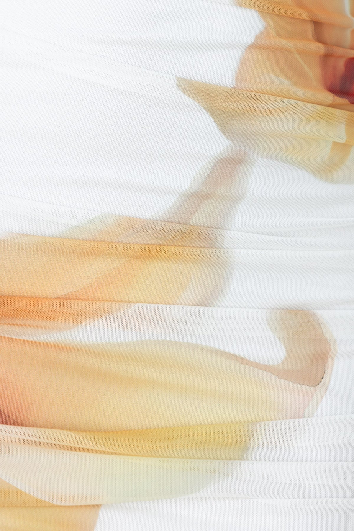 Close-up of floral detail on Feel My Spark Maxi Dress, showcasing soft colors and wrap design.