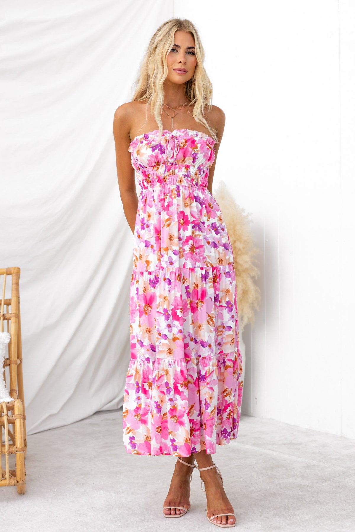 Qorla Midi Dress in floral print, strapless design with tie detail, lightweight and lined to mid-thigh.
