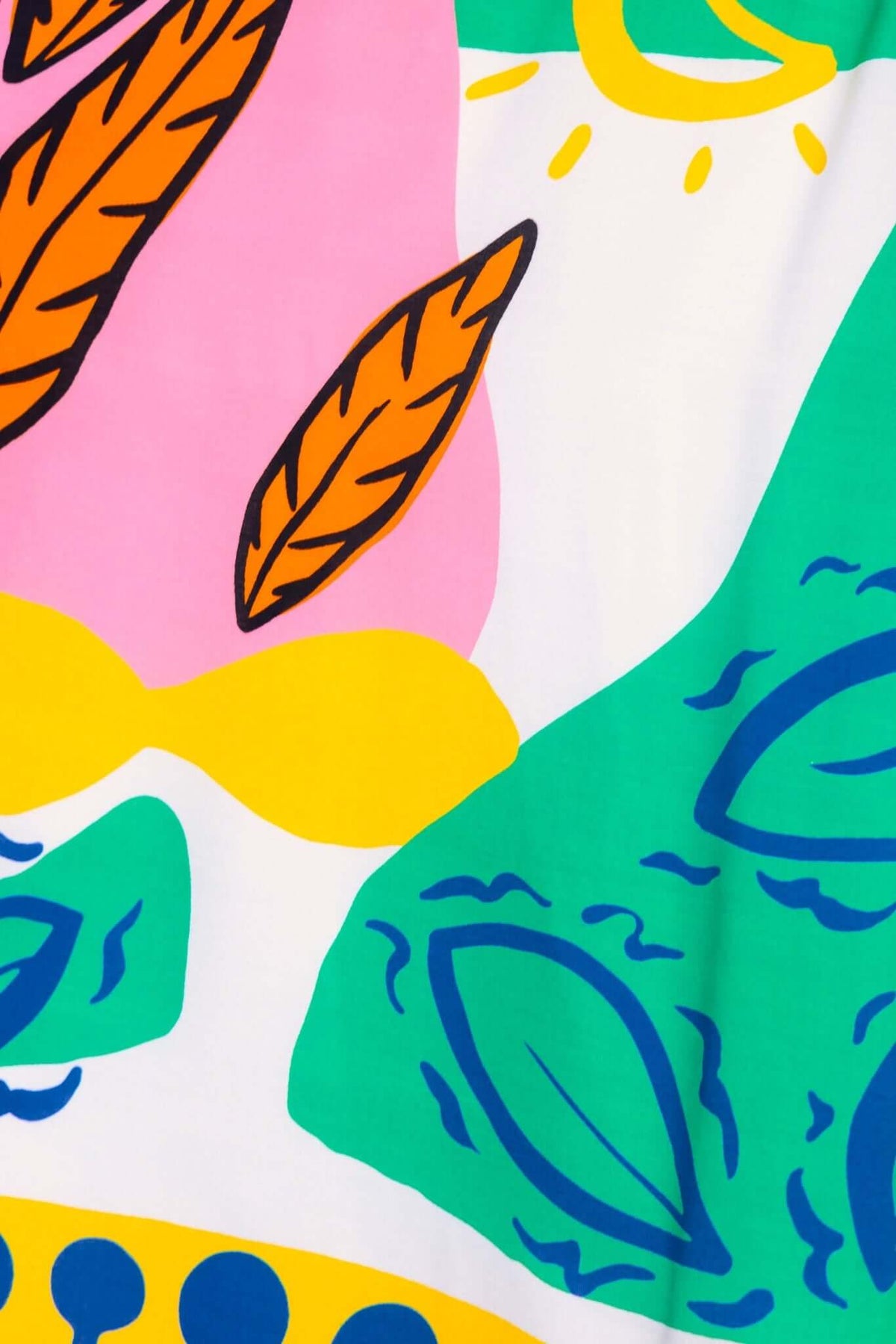 Colorful print featuring leaves and abstract shapes on the Orella Maxi Dress fabric.
