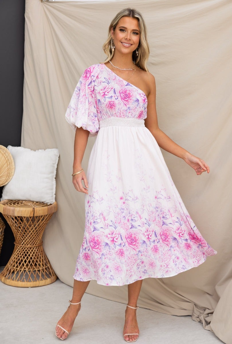 Aleyna Midi Dress featuring a floral print, one-shoulder neckline, and pockets, styled on a model.