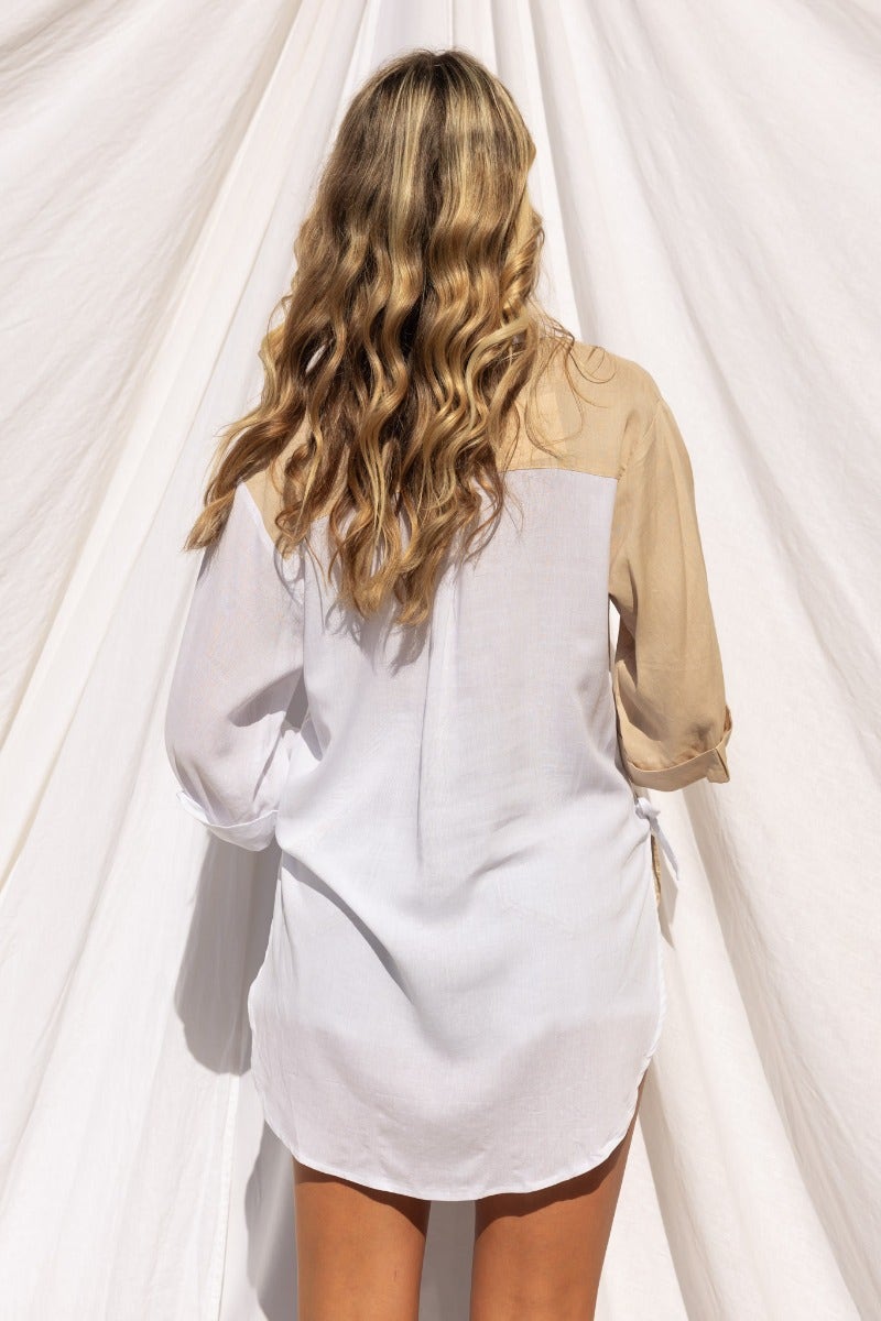 Back view of Honey Shirt featuring a light brown and white color block design, with rolled sleeves and a relaxed fit.