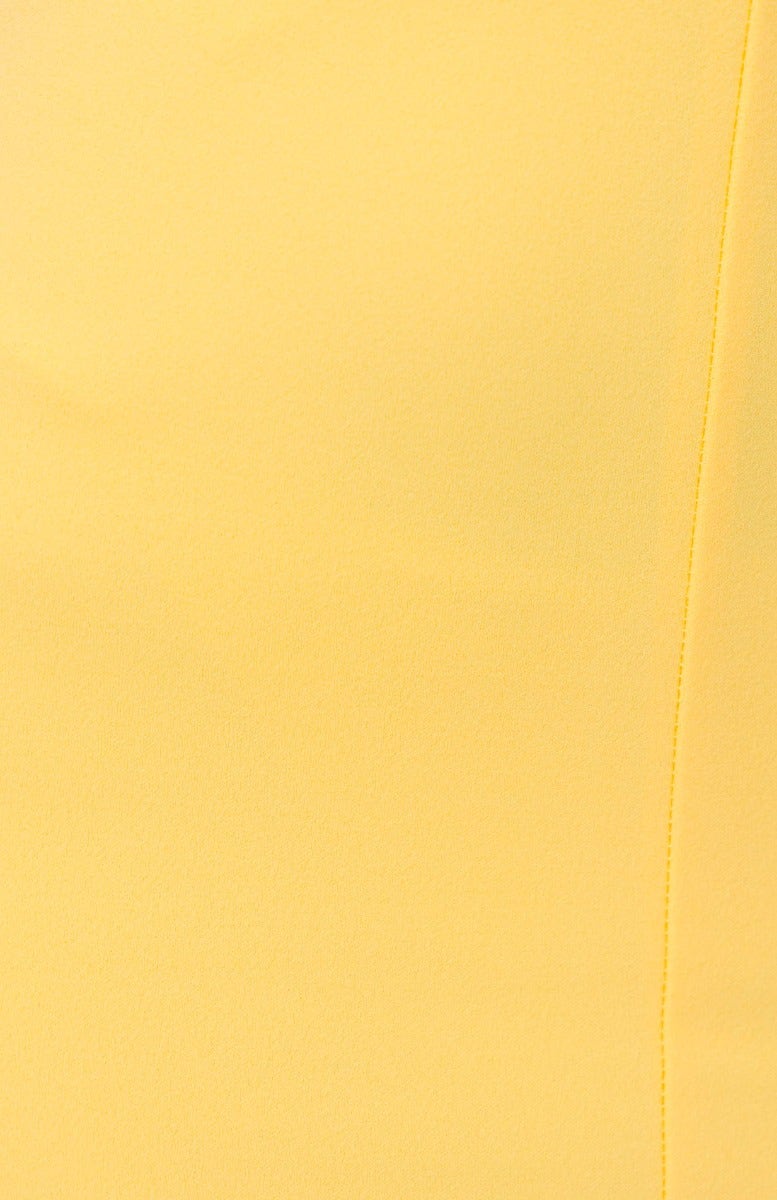 Close-up of the crepe-like fabric in a vibrant yellow, showcasing the smooth texture of the Octavia Maxi Dress.