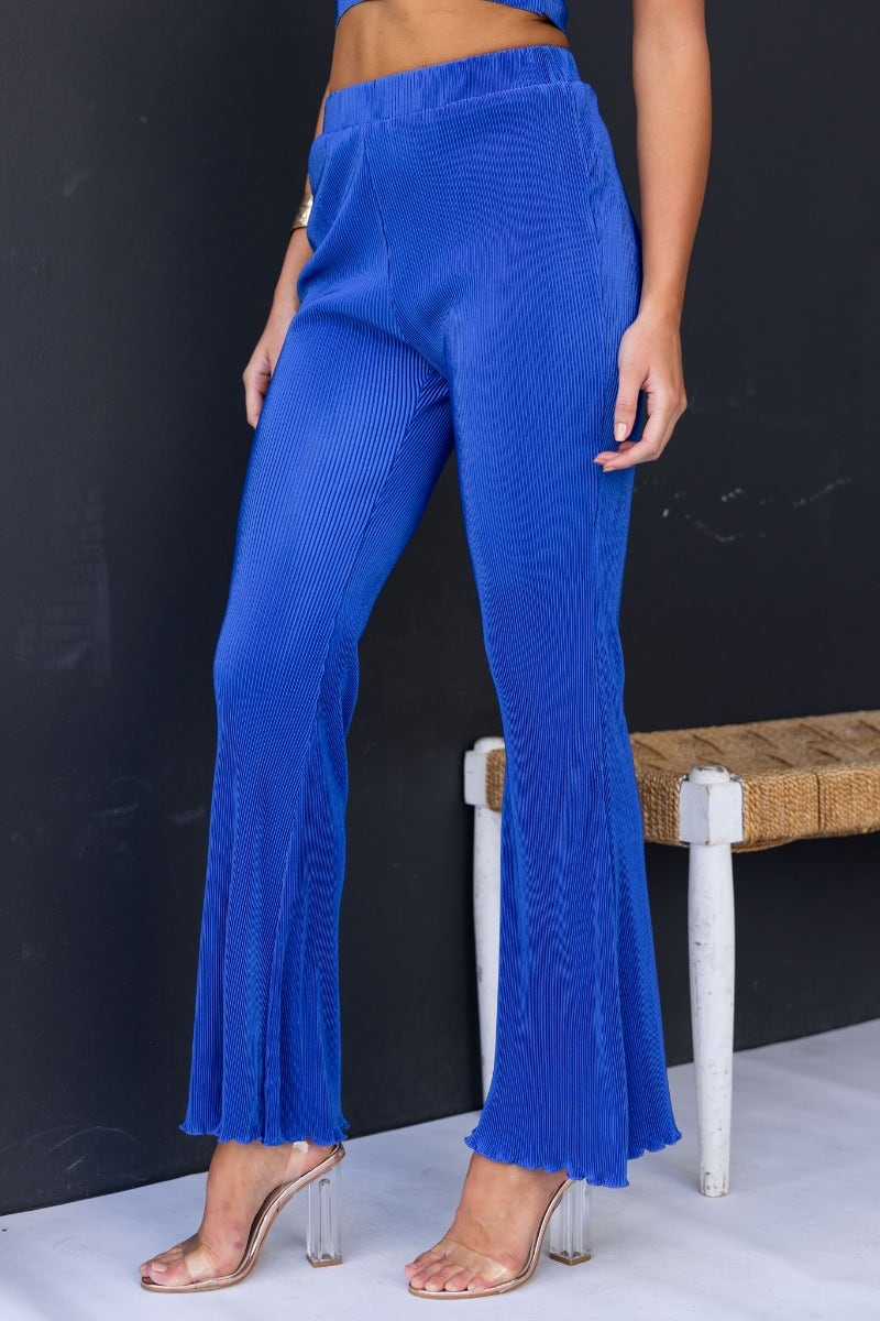 Harvie Pants in vibrant blue with accordion pleats and a flared hem, perfect for a stylish, comfortable fit.