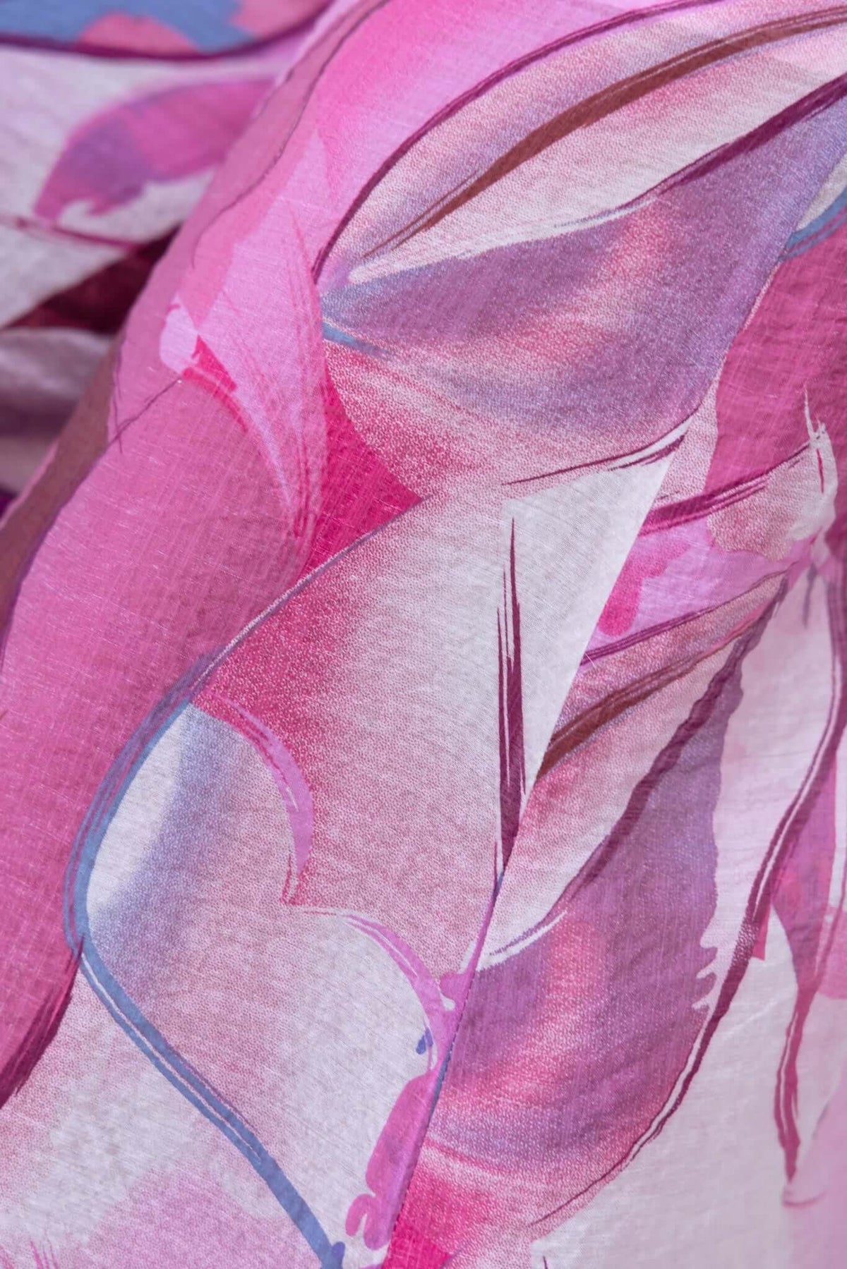 Close-up of vibrant multi-colour print fabric featuring pink floral designs, perfect for the Sun Dazed Jumpsuit.