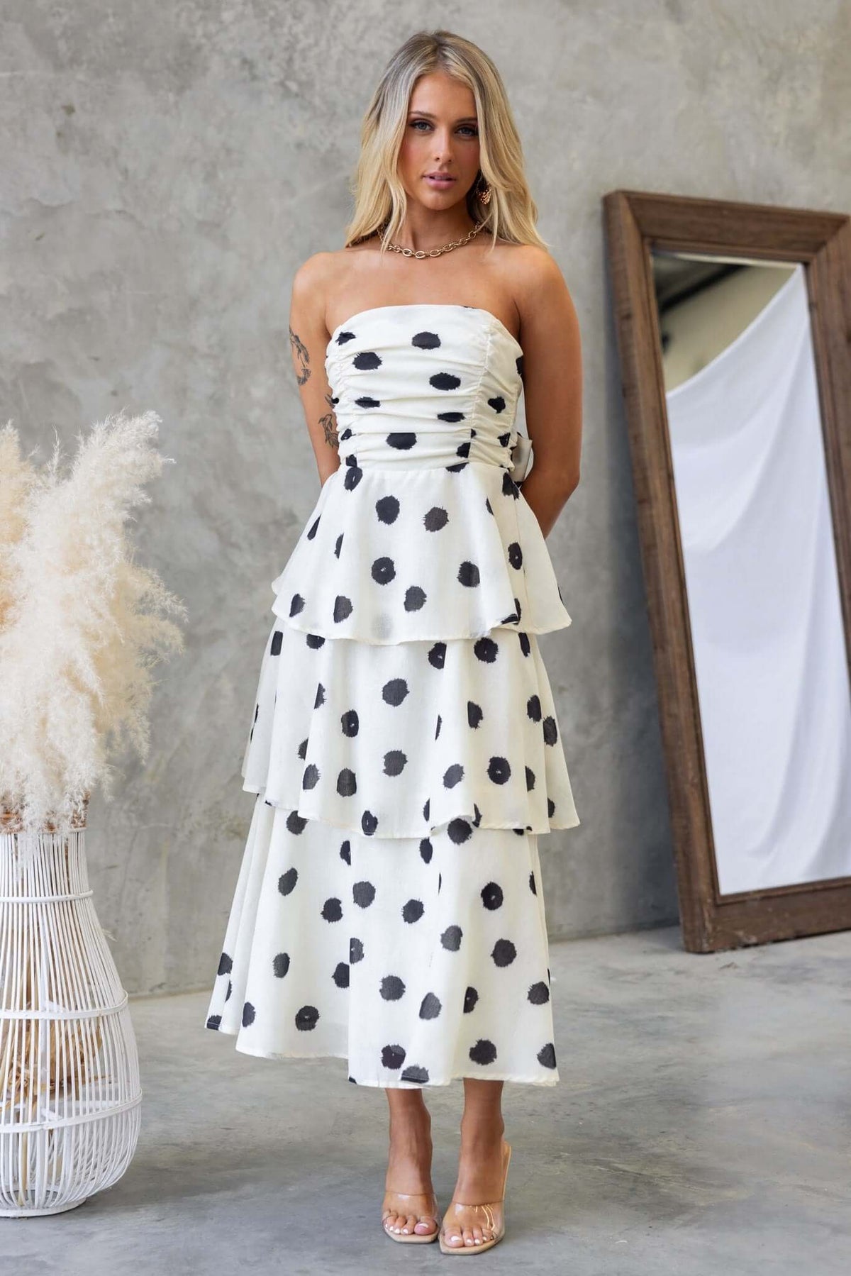 Portici Midi Dress, strapless with ruffles and polka dots, perfect for special occasions, showcasing stylish design and comfort.