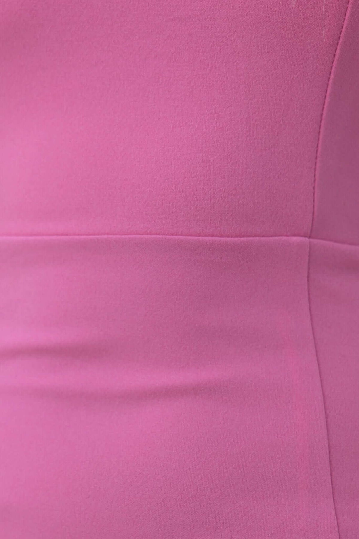 Close-up of the soft pink fabric of the Stresa Midi Dress, showcasing its smooth texture and elegant design.