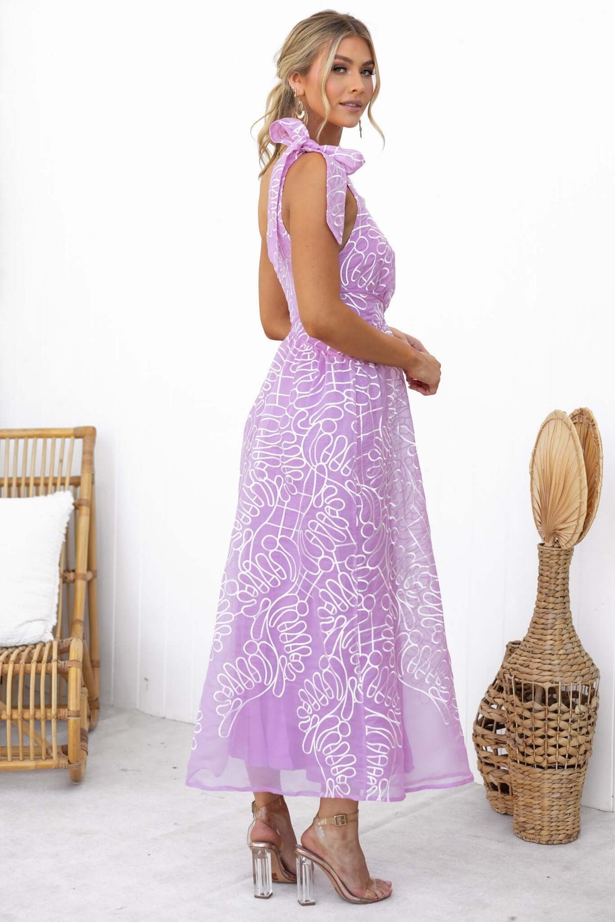 Haraka Midi Dress in lavender, one-shoulder design with tie strap, featuring floral embroidery, elegant chiffon material.