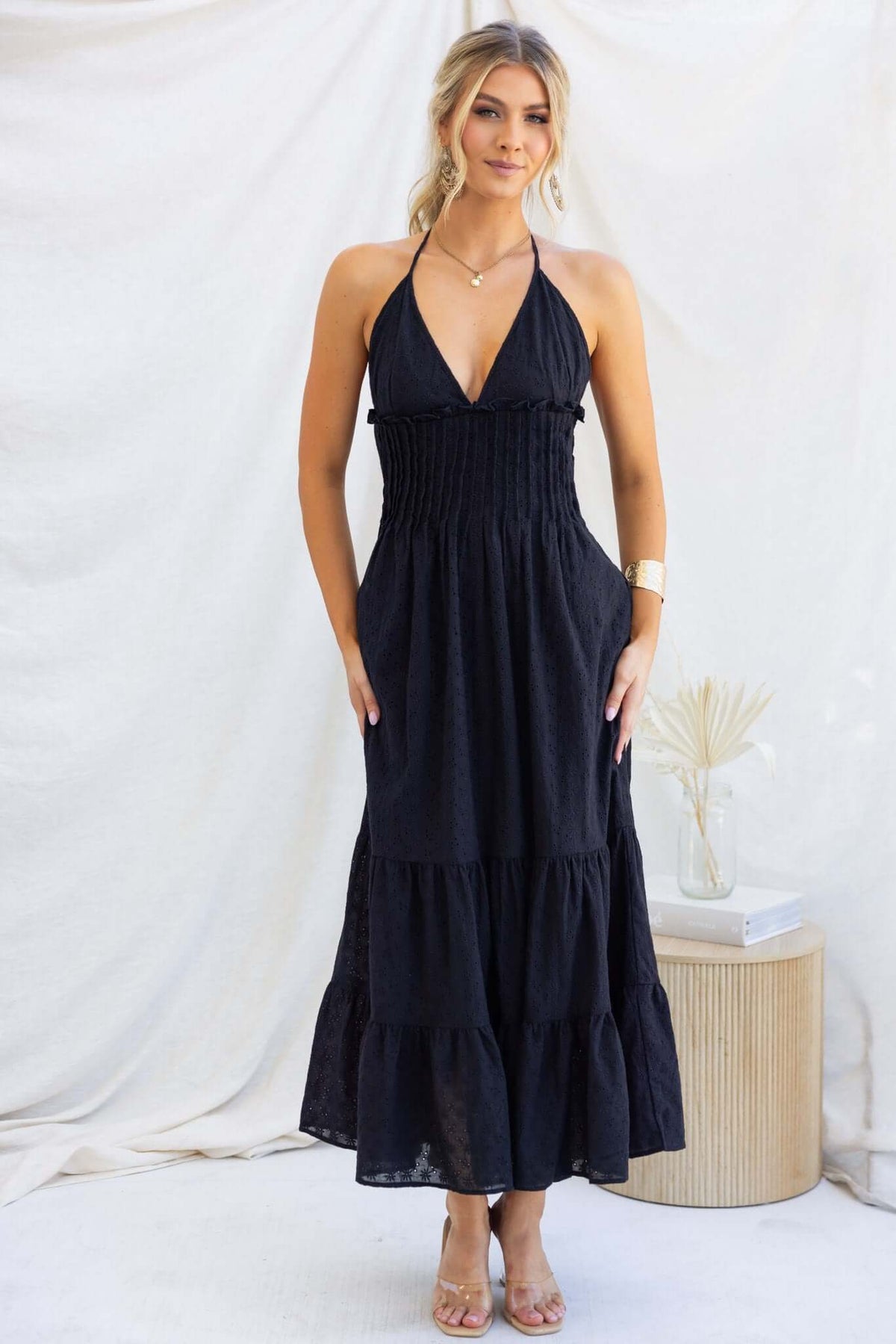 Black Bisbee Maxi Dress with tie straps, elastic back, and pockets, featuring Anglaise material and a feminine tiered design.