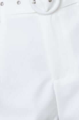 Close-up of Boston Set shorts featuring removable belt and silver buckle detail.