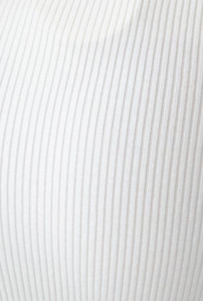 Close-up of ribbed knit fabric in white, showcasing texture for the Akara Midi Skirt.