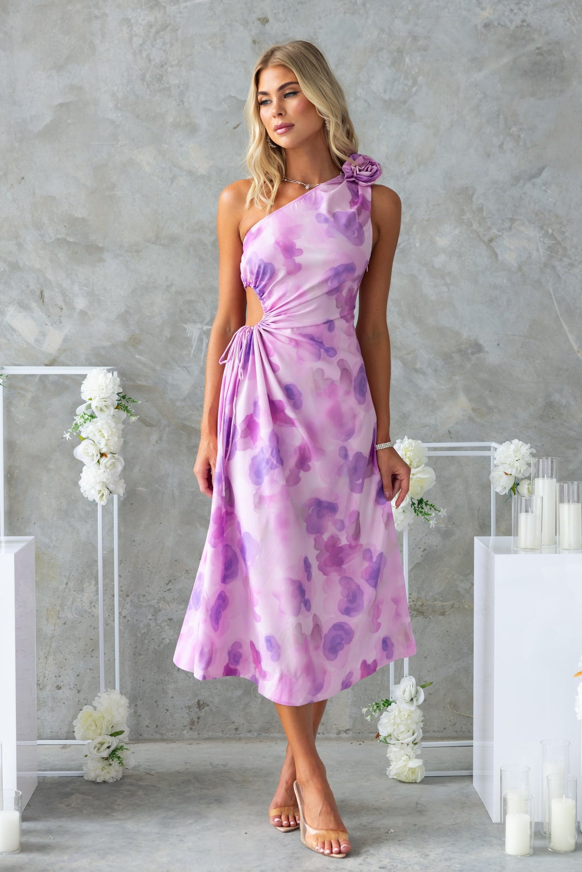 Ikaris Midi Dress featuring a floral print, one-shoulder neckline, cut-out waist, and asymmetrical hemline.