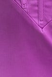 Close-up of vibrant purple fabric showcasing the texture and sheen of the Lars Maxi Dress material.