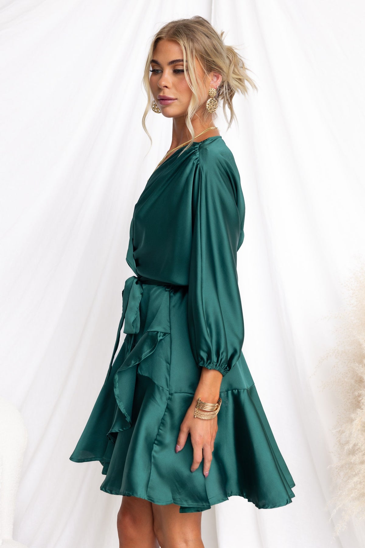 Elegant green Xention Dress with V-neckline, batwing sleeves, and removable belt, displayed on a model.