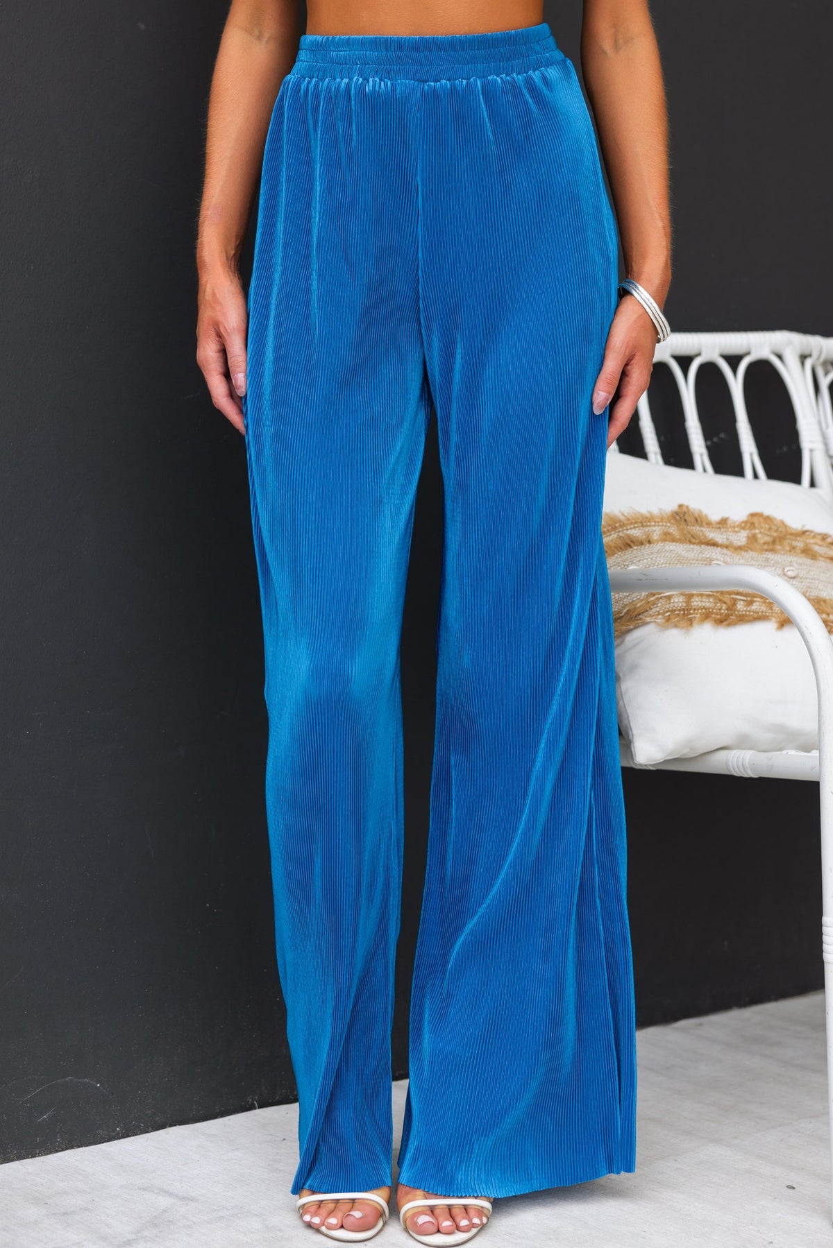 Farida Pants in blue, featuring accordion pleats, elastic waistband, and wide legs, perfect for stylish comfort.