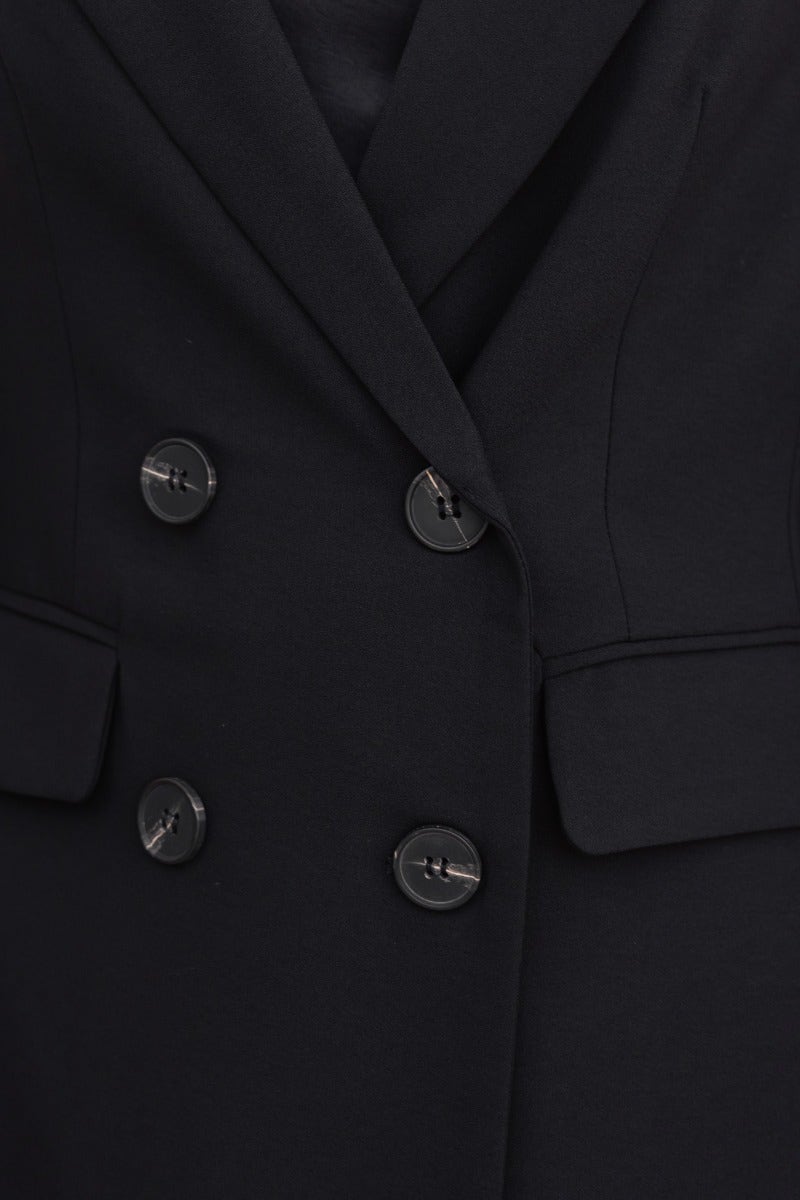 Close-up of Estel Black Blazer featuring double buttons, collar, lapel, and faux pockets.